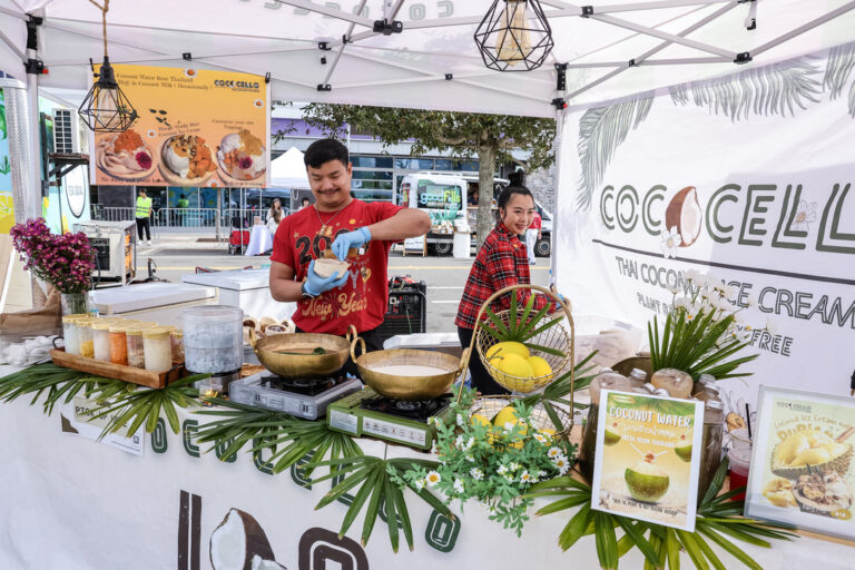Vendors serving Thai coconut ice cream from their booth at Celebrate Lunar