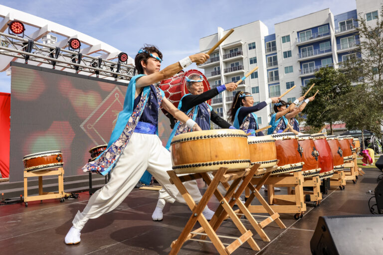 A taiko drumming group performing on the main stage at Celebrate Lunar